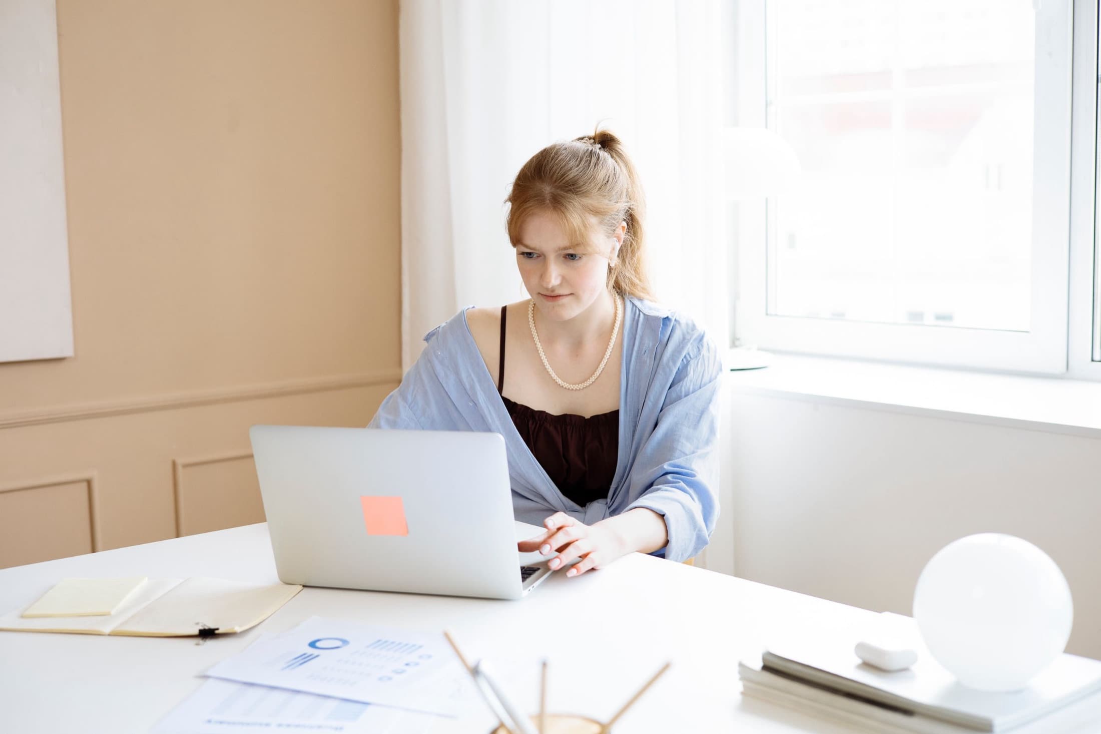 A candidate preparing quietly at a laptop
